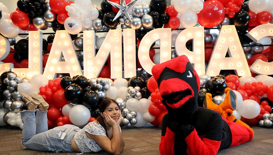 Red the cardinal with a student