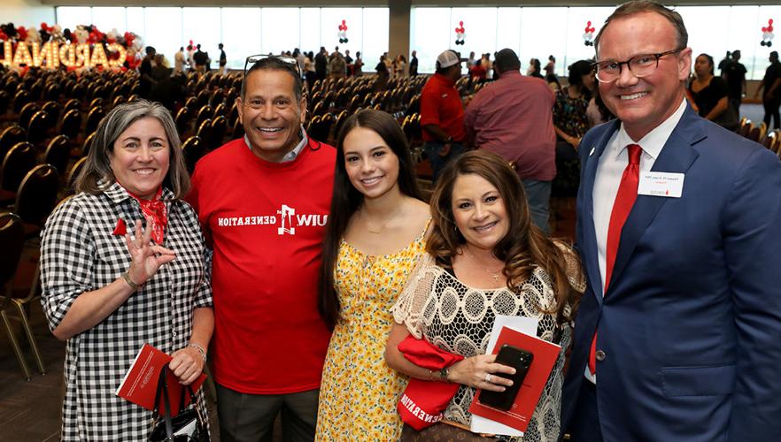 UIW president with students